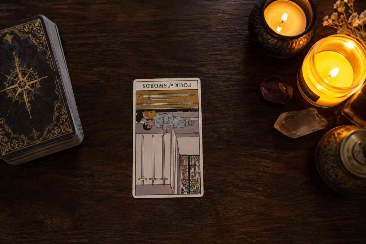 Four of Swords Reversed: Meaning, Love, Career & Advice 