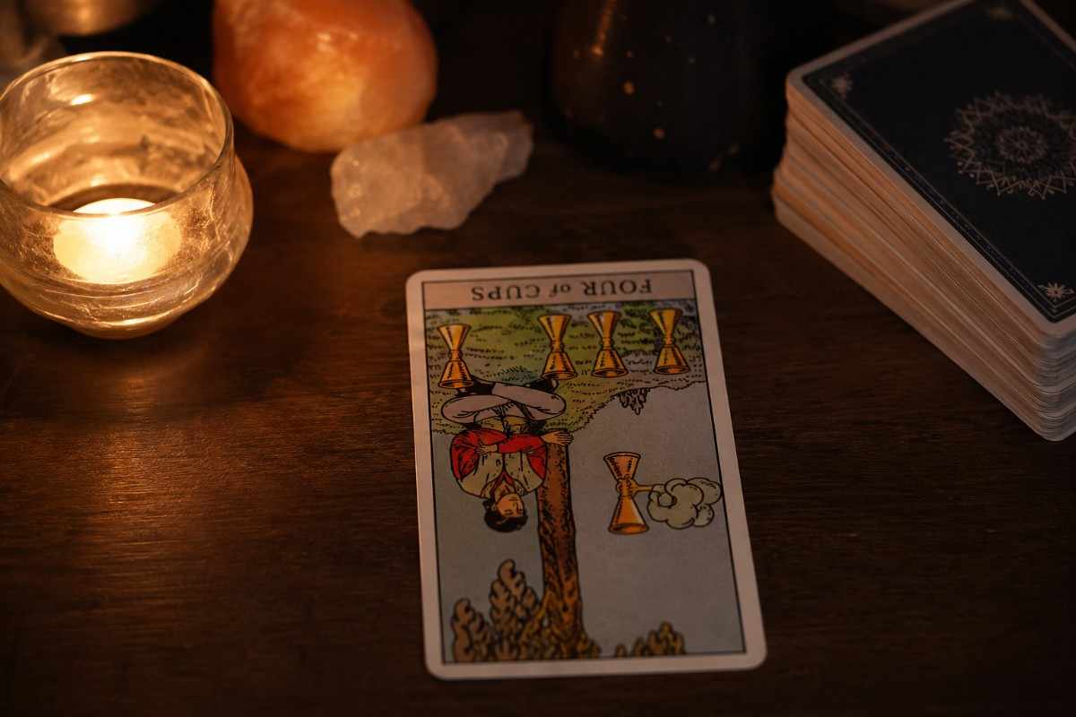 Four of Cups Reversed: Meaning in Love and Career