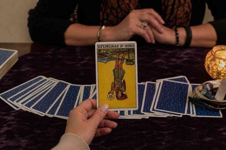 Page of Pentacles Reversed: Meaning, Symbolism & Guidance