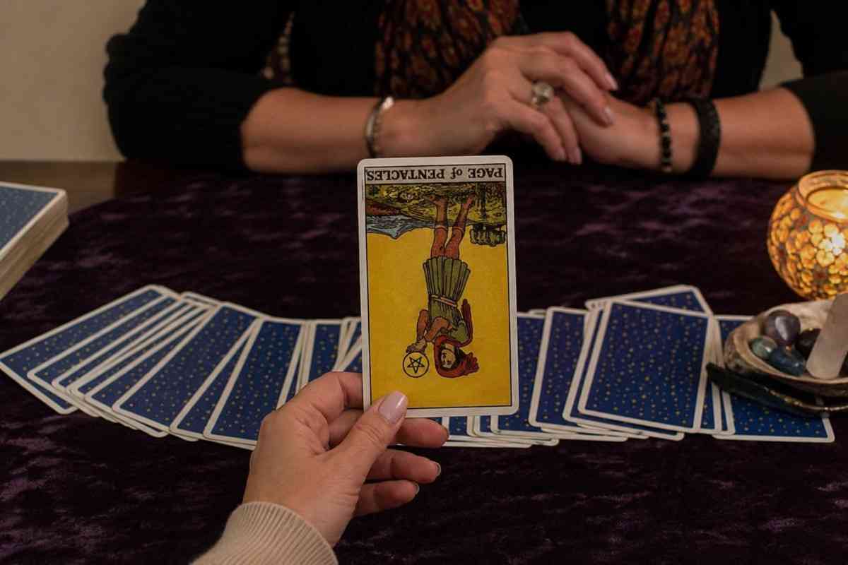 Page of Pentacles Reversed: Meaning, Symbolism & Guidance